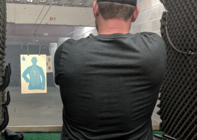 A man practices shooting at NWA Tactical & Range